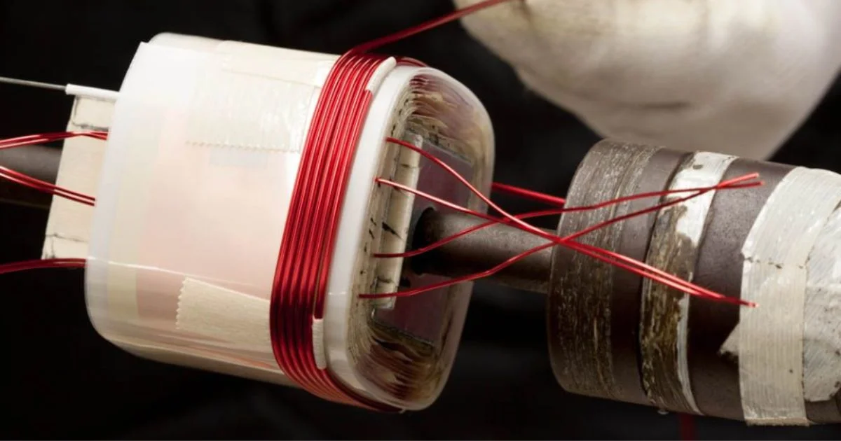 Close-up of custom transformer coil winding during magnetic component manufacturing